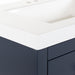 Corner of Bainbridge 30.5" deep blue bathroom Vanity with drawers and white sink top