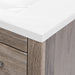 Corner closeup of 30.25 in Breena half-bath vanity with woodgrain laminate finish, 2-door cabinet, base drawer, chrome hardware