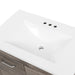 Predrilled sink top on 30.25 in Breena half-bath vanity with woodgrain laminate finish, 2-door cabinet, base drawer, chrome hardware