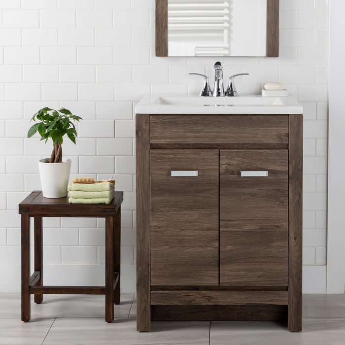 Devere light gray woodgrain bathroom vanity installed in bathroom with faucet and mirror