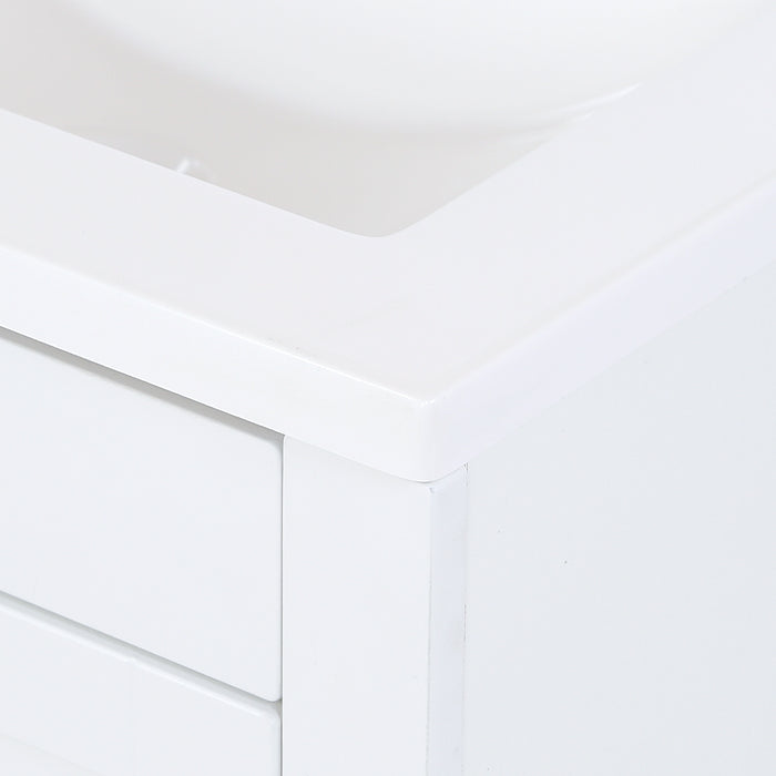 Corner closeup of Lonsdale 24 inch white half-bath vanity with two doors and white sink top