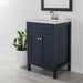Front view of 24.5” wide Marilla bathroom vanity, shown here in blue finish with white sink top, mirror, hand soap and other bathroom items.