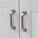 Close view of the satin nickel door and drawer pull hardware on 30.25" Noelani powder room vanity, shown here in Elm Sky finish 