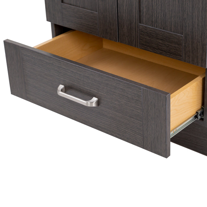 Close view of an extended drawer on the Noelani 24.25” wide powder room vanity features satin nickel hardware and a Milano Oak finish