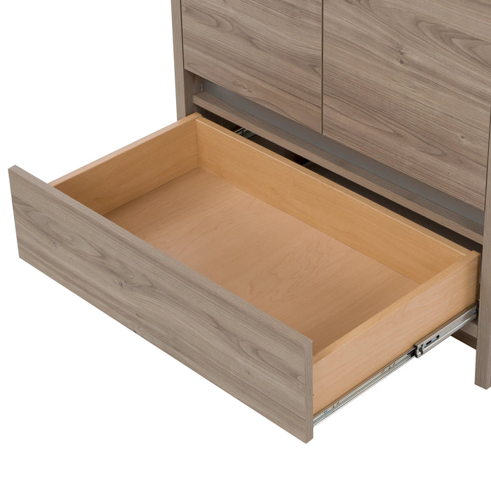 Open base drawer on Trente 30 inch 2-door, 1-drawer, bathroom vanity with woodgrain finish and white sink top