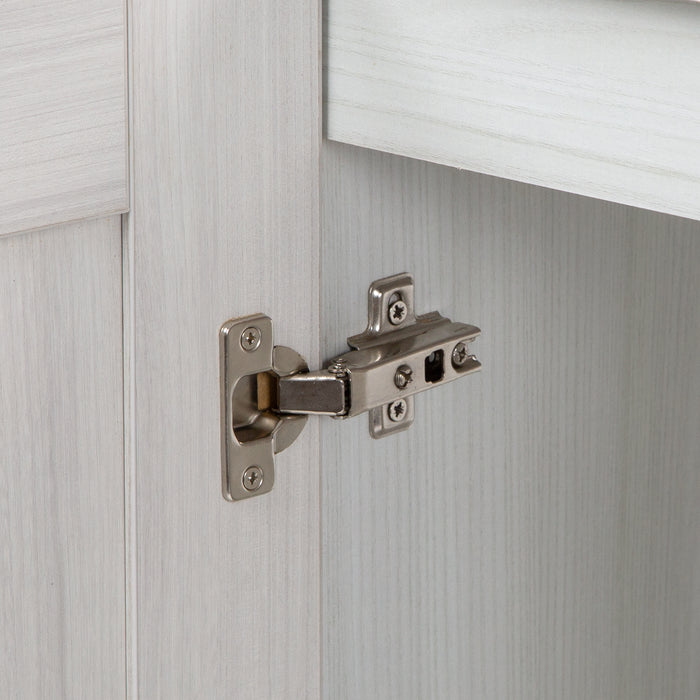 Image shows soft-close cabinet door hinge for 30.25" Noelani powder room vanity, shown here in Elm Sky finish
