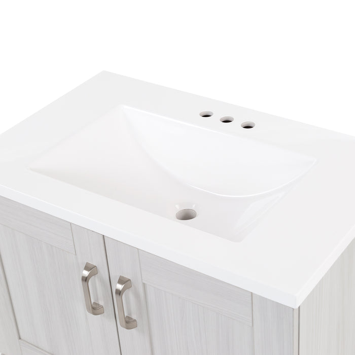 View of the 30.25" Noelani powder room vanity bright white cultured marble sink top with an integrated sink that is predrilled for a 4" centerset faucet