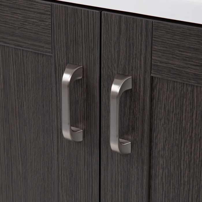 Close view of the satin nickel door and drawer pull hardware on 30.25" Noelani powder room vanity, shown here in Milano Oak finish 