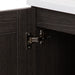 Image shows soft-close cabinet door hinge for 30.25" Noelani powder room vanity, shown here in Milano Oak finish