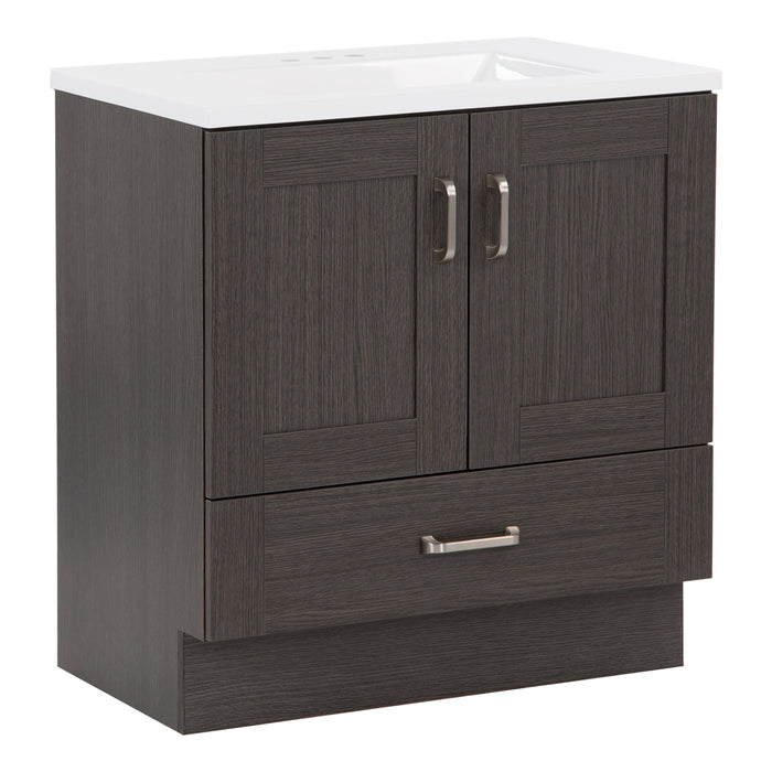 Angled side view of 30.25" Noelani powder room vanity features a transitional design with inset Shaker-style doors, a flat-panel drawer, and satin nickel door and drawer pulls – shown here in Milano Oak finish