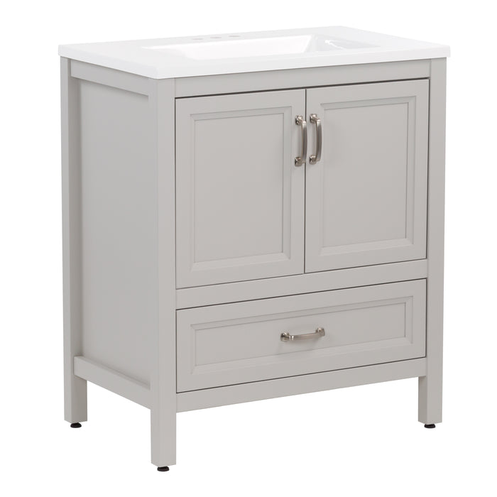 Angled view of Destan 30 in light gray bathroom vanity with base drawer, cabinet, polished chrome hardware, white sink top