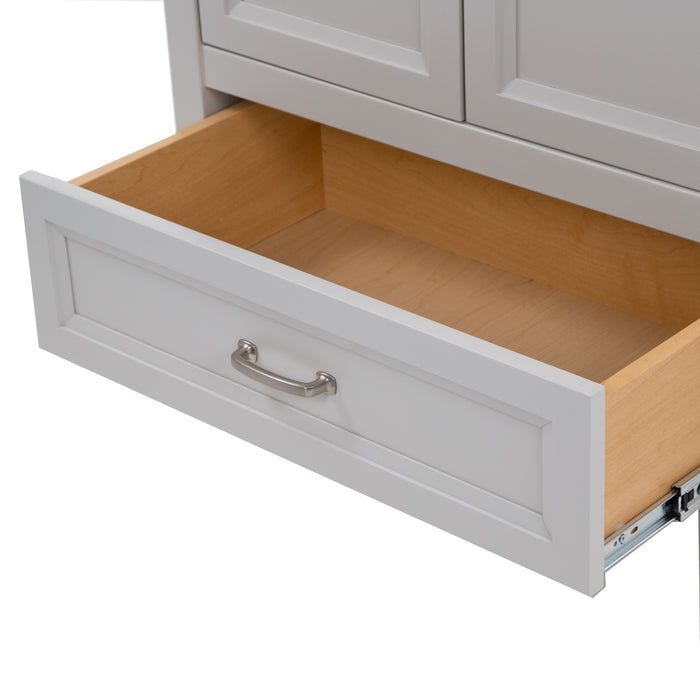 Open base drawer on Destan 30 in light gray bathroom vanity with base drawer, cabinet, polished chrome hardware, white sink top