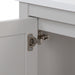 Adjustable hinge on Destan 30 in light gray bathroom vanity with base drawer, cabinet, polished chrome hardware, white sink top