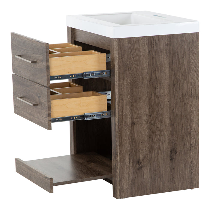 Two open drawers and pull-out shelf on Fisk 24.5" W woodgrain cabinet-style bathroom vanity, white sink top