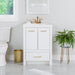 Hali 24.5 small white bathroom vanity with 2-door cabinet, 1 drawer, brushed gold hardware, white sink top installed in bathroom with faucet and mirror