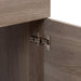 Closeup of 6-way adjustable hinges on Hurley 18.25" wide woodgrain finish bathroom vanity