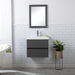 Innes 24.5" W gray floating bathroom vanity installed in bathroom with mirror and plant