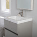 Innes 24.5" W gray floating bathroom vanity mounted on wal in bathroom with mirror and window