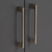 Close up of satin nickel cabinet door handles on Innes 48" wide gray floating vanity