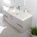 Innes 48.5" W gray floating vanity with 2 doors with handles, 4 drawers, white sink top mounted on wall with faucet