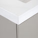 Closeup of corner Innes 30.5" W gray floating bathroom vanity with 2 flat-panel drawers, white sink top