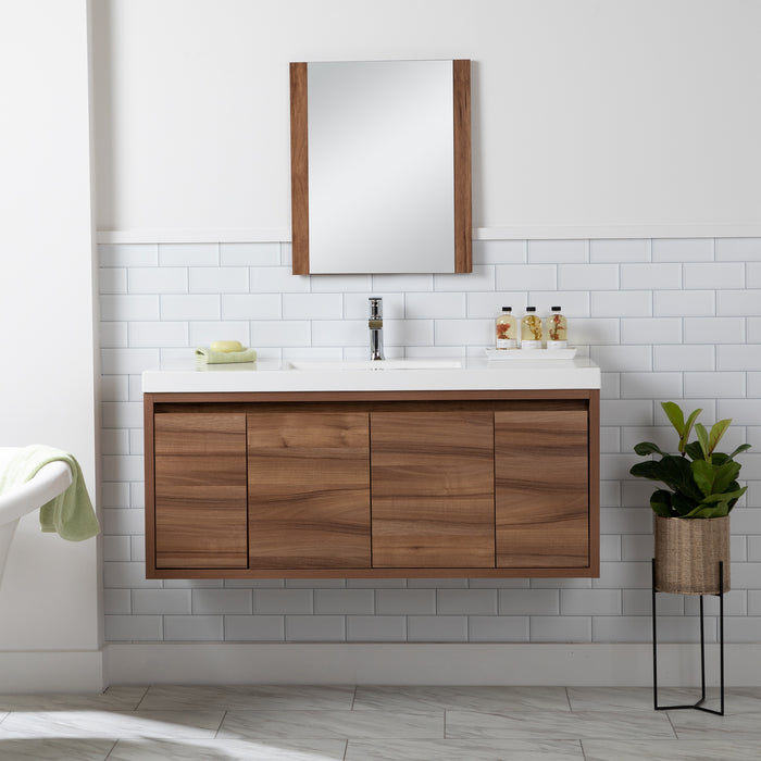 Kelby 48.5" W modern woodgrain floating bathroom vanity installed in bathroom with mirror and plant