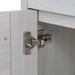 Adjustable hinge on Marlowe 30.5 in gray woodgrain floating bathroom vanity with 1-door cabinet, 2 side drawers, and white sink top