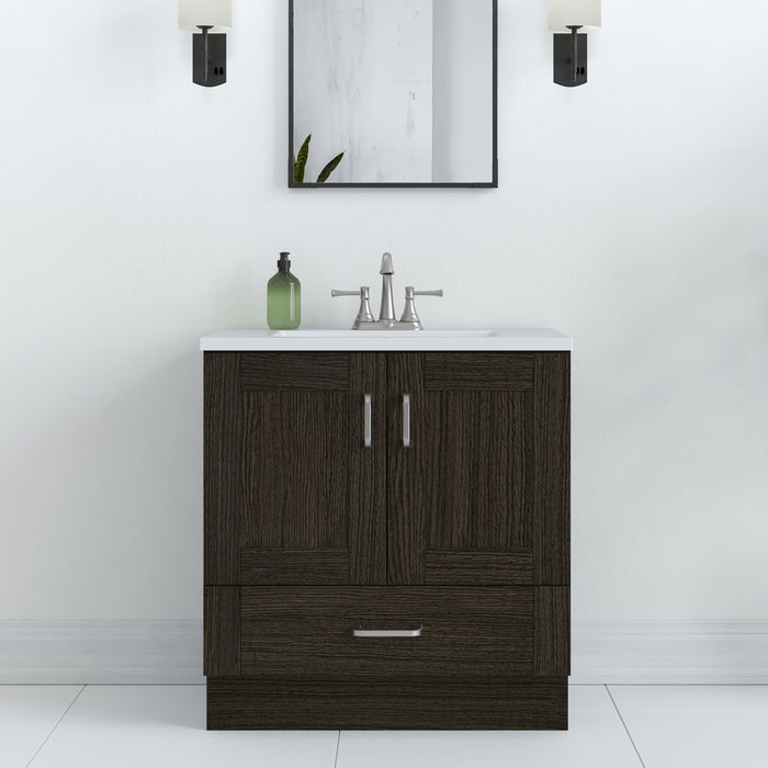 Front view of 30.25" Noelani powder room vanity, shown here in Milano Oak finish with mirror, hand soap and other bathroom items.