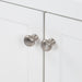 Satin Nickel door knobs on Wyre 24.5" W white Shaker-style bathroom vanity