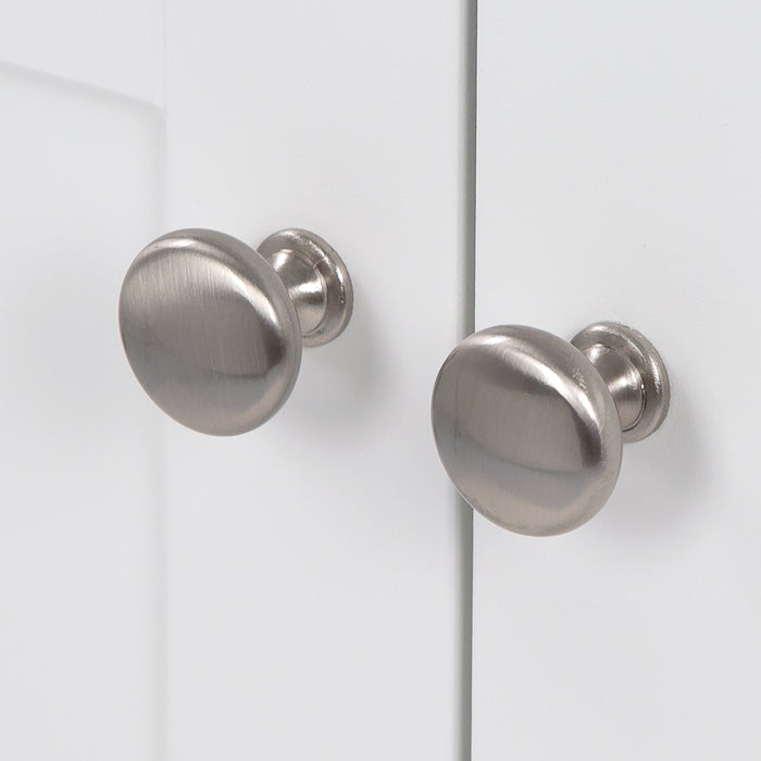 Brushed Nickel door knobs on Yereli 24.25" W white Shaker-style bathroom vanity