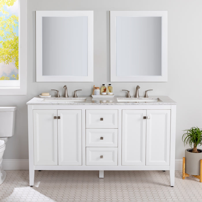Cartland 61-in double-sink white bathroom vanity with two 2-door cabinets, 3 drawers, granite-look sink top installed in bathroom with two mirrors and faucets