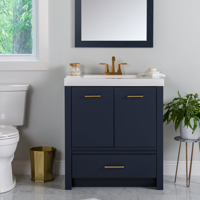 Hali 30.5 small blue bathroom vanity with 2-door cabinet, 1 drawer, brushed gold hardware, white sink top installed in bathroom with faucet and mirror