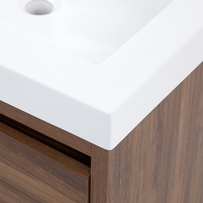 Closeup of corner of Kelby 24.5" W floating vanity with woodgrain finish and white sink top