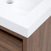 Closeup of corner of Kelby 24.5" W floating vanity with woodgrain finish and white sink top