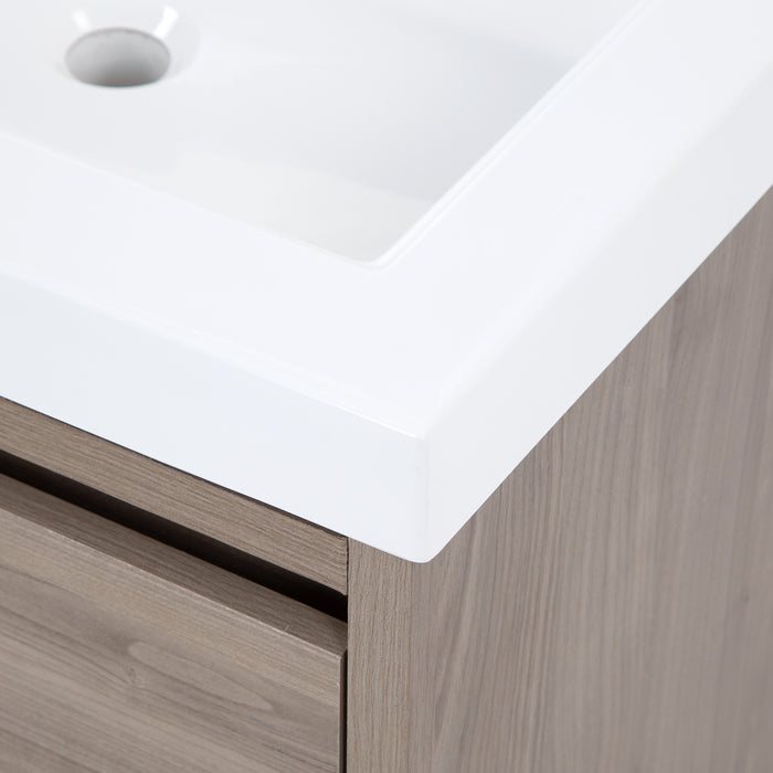 Closeup view of corner of Kelby 24.5" W floating vanity with woodgrain finish and white sink top
