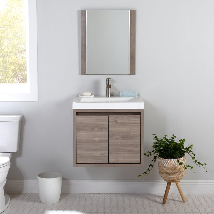 Kelby 24.5" W modern floating bathroom vanity mounted on wall in bathroom with mirror and plant
