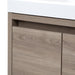 Closeup of corner of Kelby 24.5" W floating bathroom vanity with woodgrain finish and white sink top