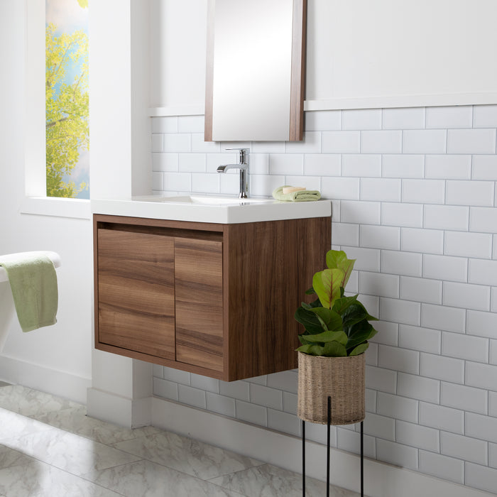  Kelby 30.5" W woodgrain cabinet-style floating bathroom vanity installed in bathroom with mirror and plant