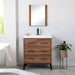 Rialta 30.5" W 3-drawer vanity with matte black legs installed in bathroom with faucet