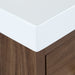 Closeup of Rialta 30.5" W furniture-style bathroom vanity with white sink top